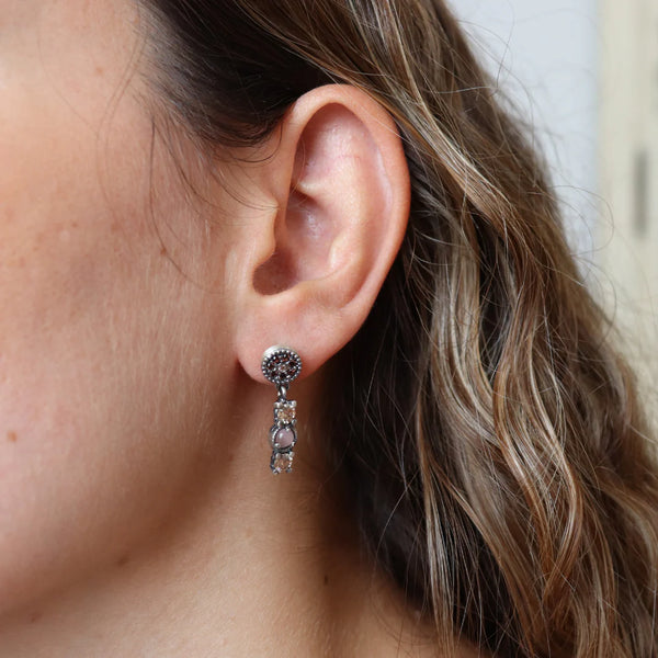 Pendientes largos con ojo de gato rosa