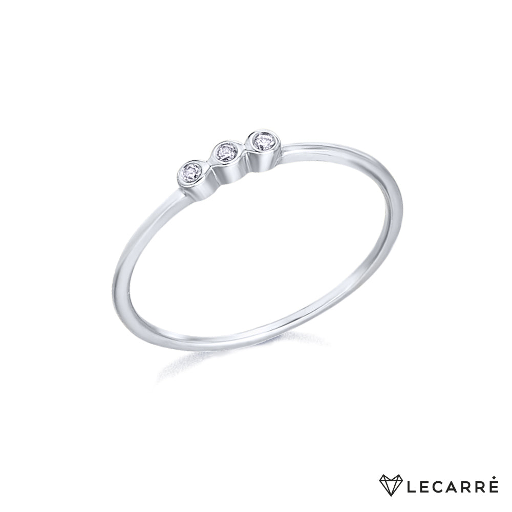 Anillo oro blanco con tres brillantes