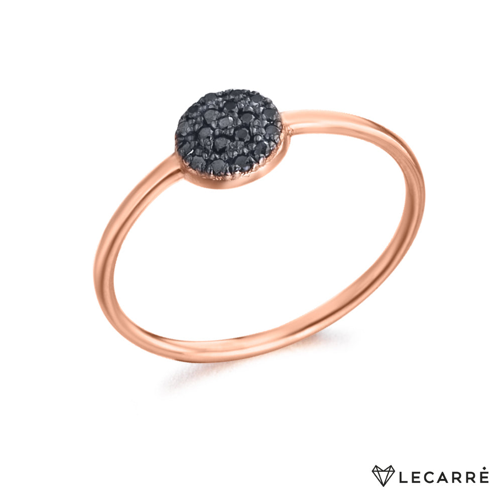 Anillo oro rosa cuajado brillantes negros