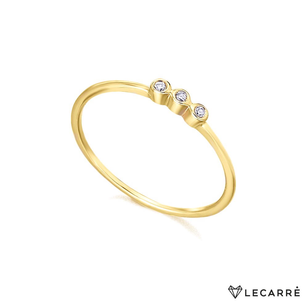 Anillo oro amarillo con tres brillantes