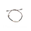 Pulsera plata en macramé con ojo de gato rosa y calcedonia