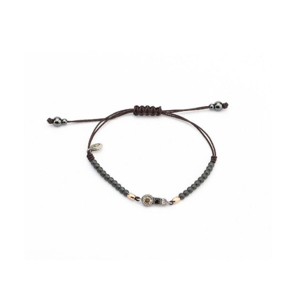 Pulsera de macramé en plata con ojo de gato